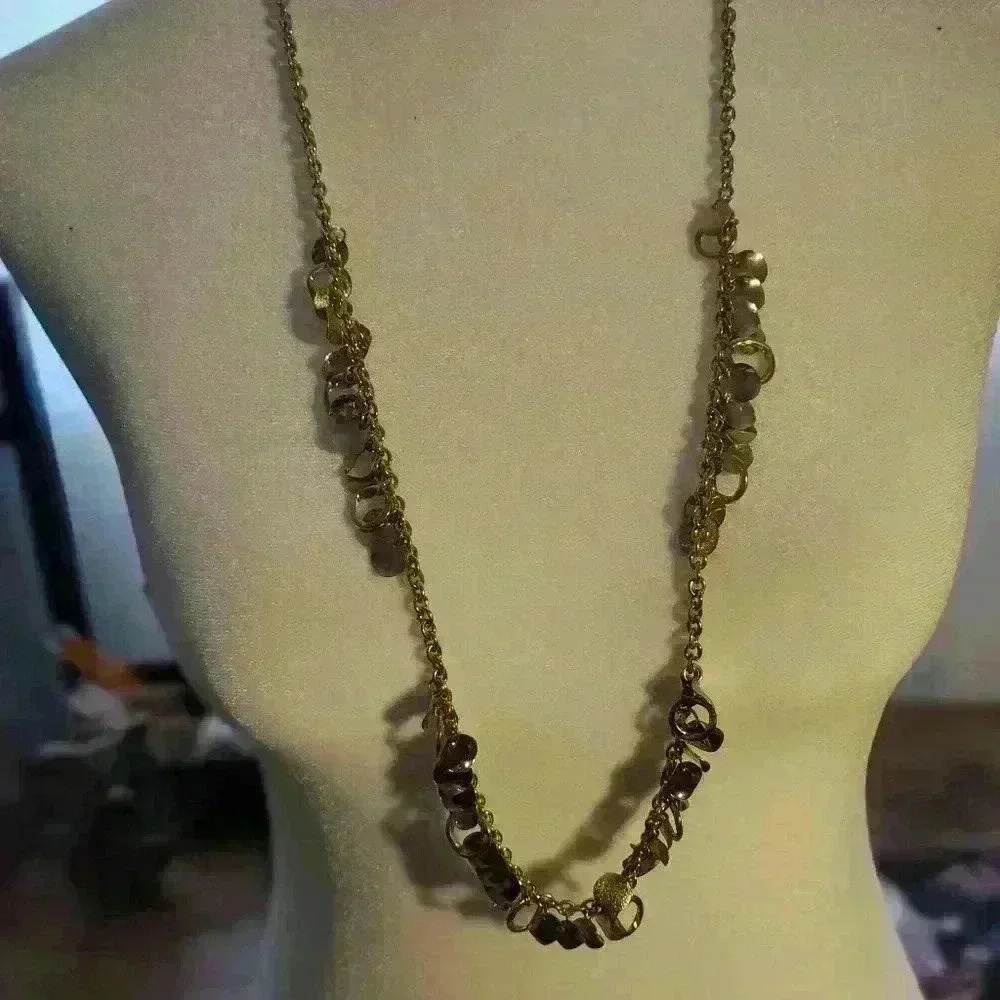 Gold tone disk necklace 31" plus extender